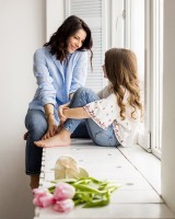 ._-happy-mother-daughter-sitting-window-sill_out.jpg